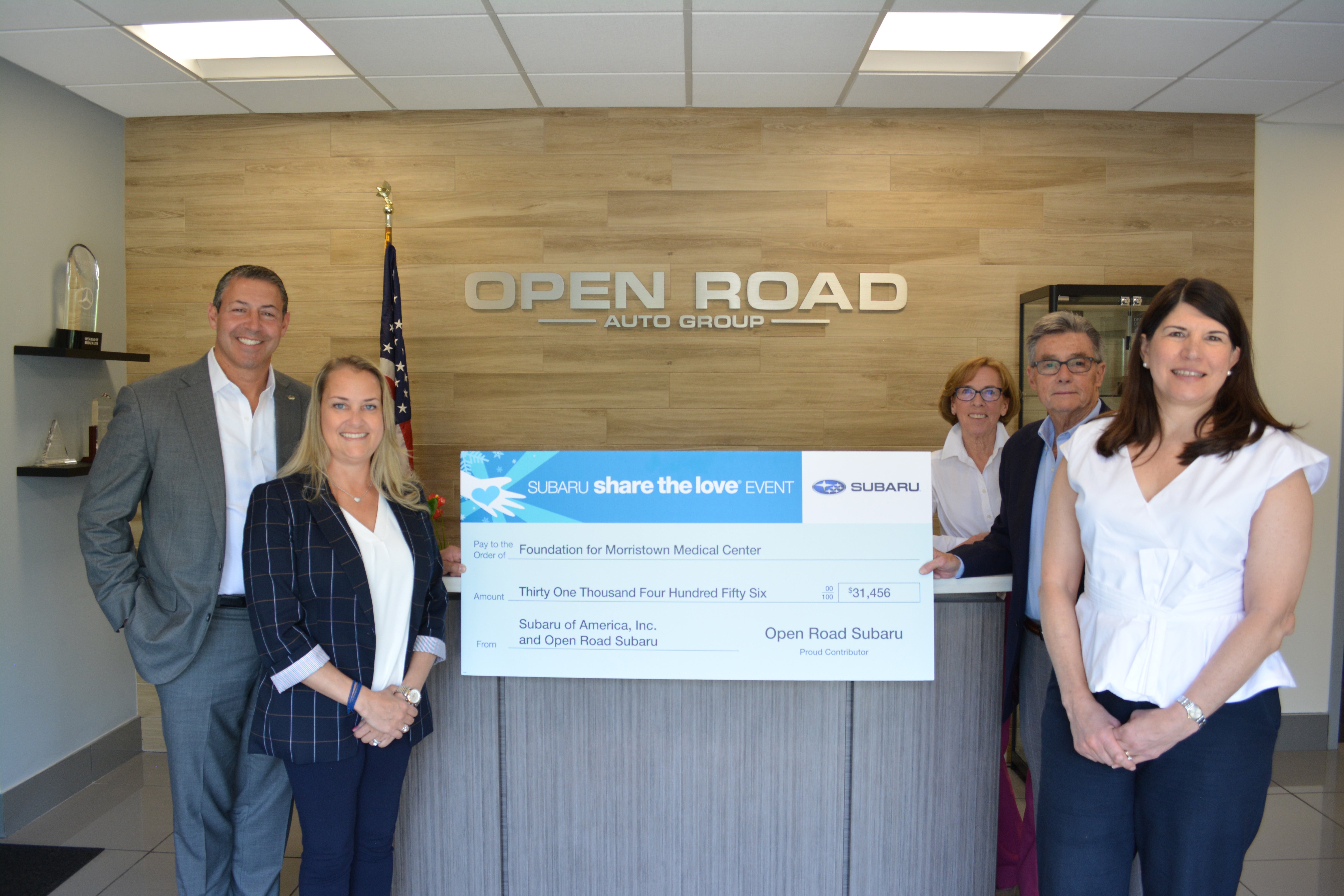 Open Road Leadership Presents Subaru Share The Love Charitable Donation