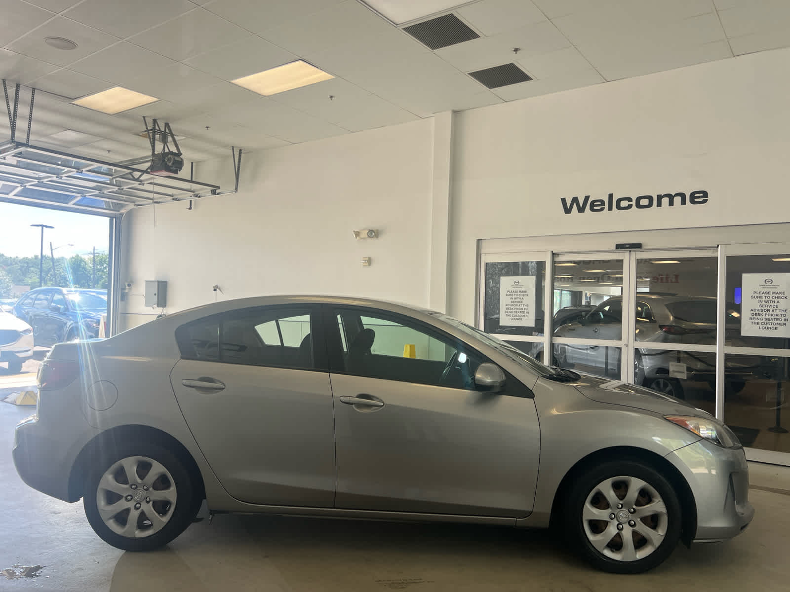 2013 Mazda MAZDA3 4dr Sdn Auto i Sport
