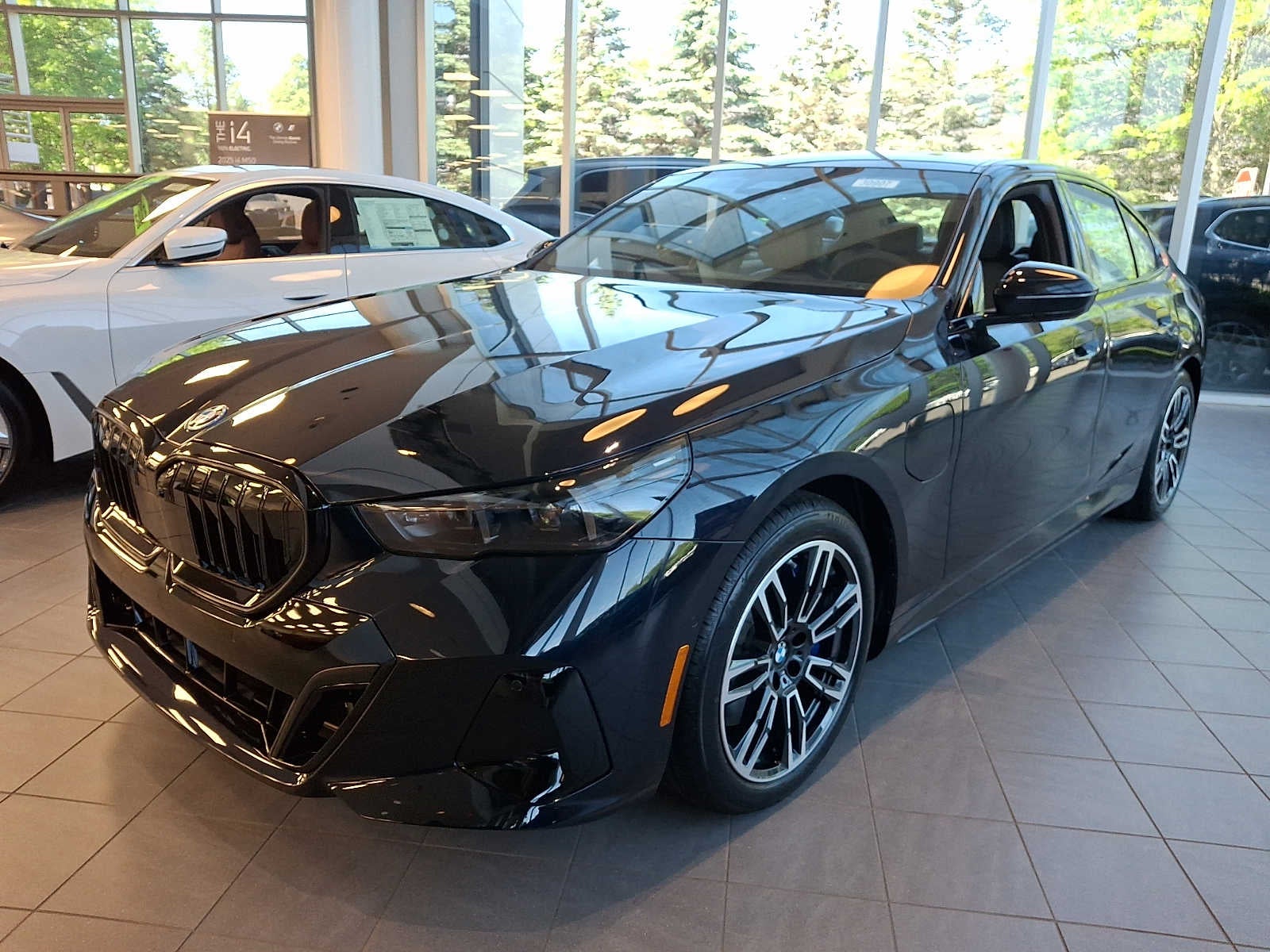 2027 BMW 5 Series 550e xDrive Sedan