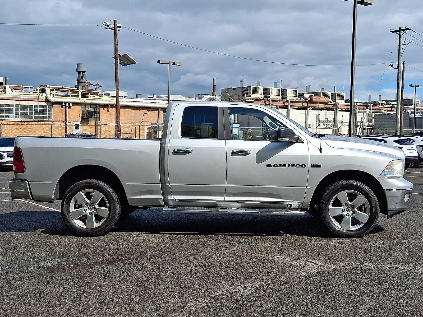 2011 RAM 1500 4WD Quad Cab 140.5 Big Horn